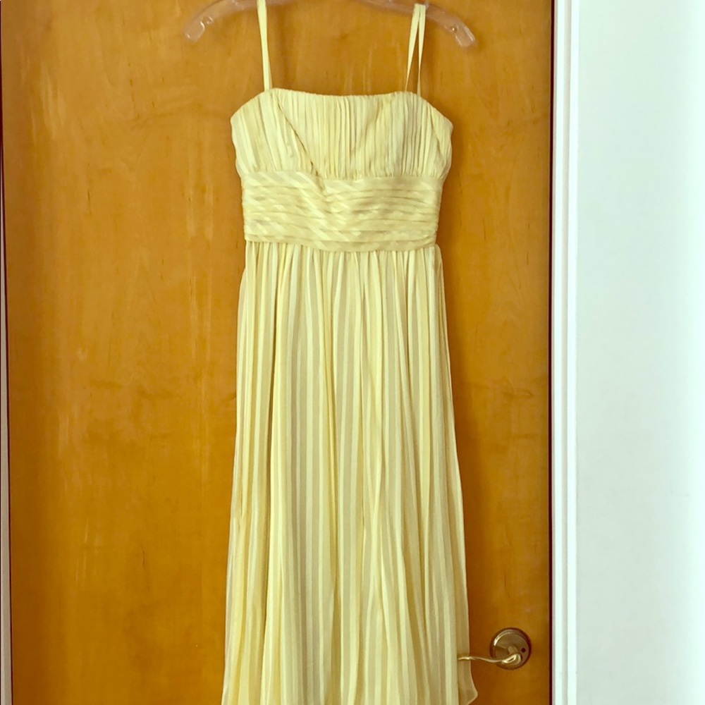 Long strapless yellow BCBG prom dress